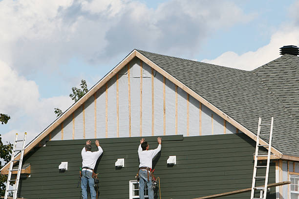 Professional Storm Damage Siding Repair technician working in Blacklick, OH